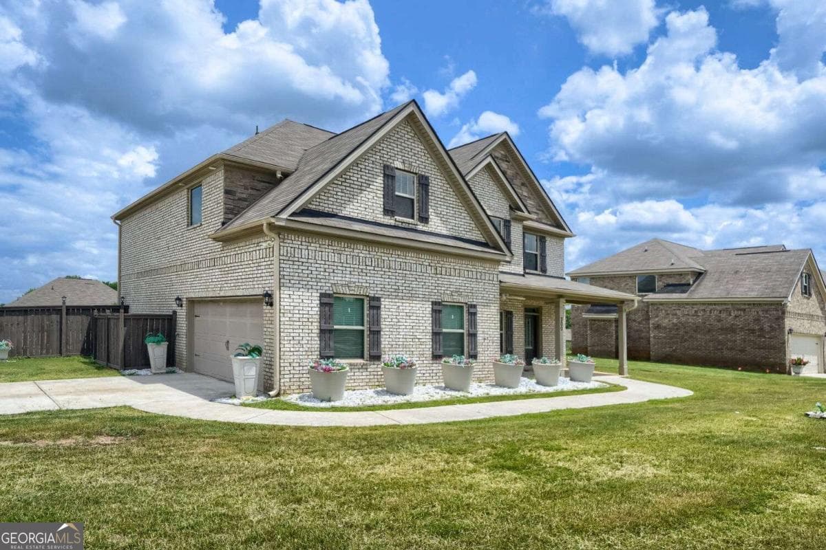 5 bedroom, 3 bathroom, 2,966 sq ft single family residence for sale at 300 Olympian Drive, Ellenwood, GA 30294 — photo 3