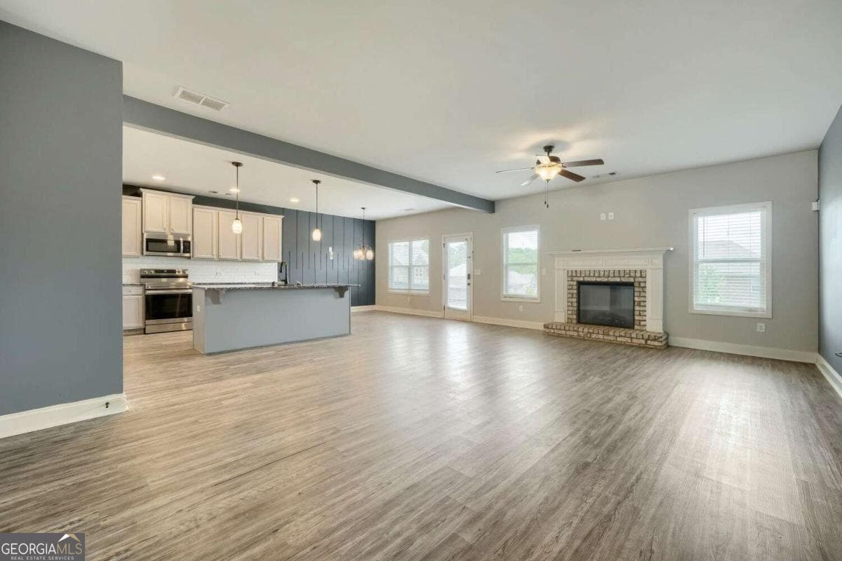 5 bedroom, 3 bathroom, 2,966 sq ft single family residence for sale at 300 Olympian Drive, Ellenwood, GA 30294 — photo 5