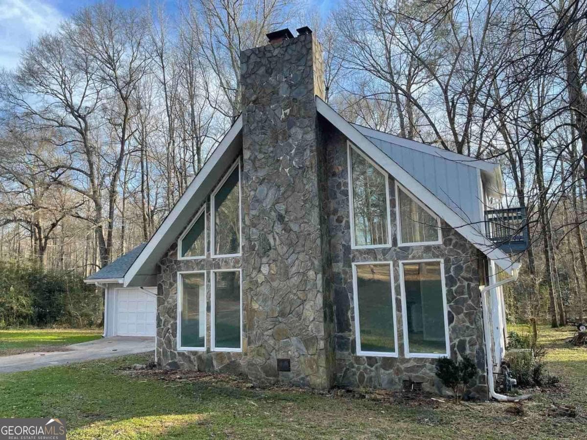 3 bedroom, 2 bathroom, 1,789 sq ft single family residence for sale at 2105 Honeybee Creek Drive, Griffin, GA 30224 — photo 4