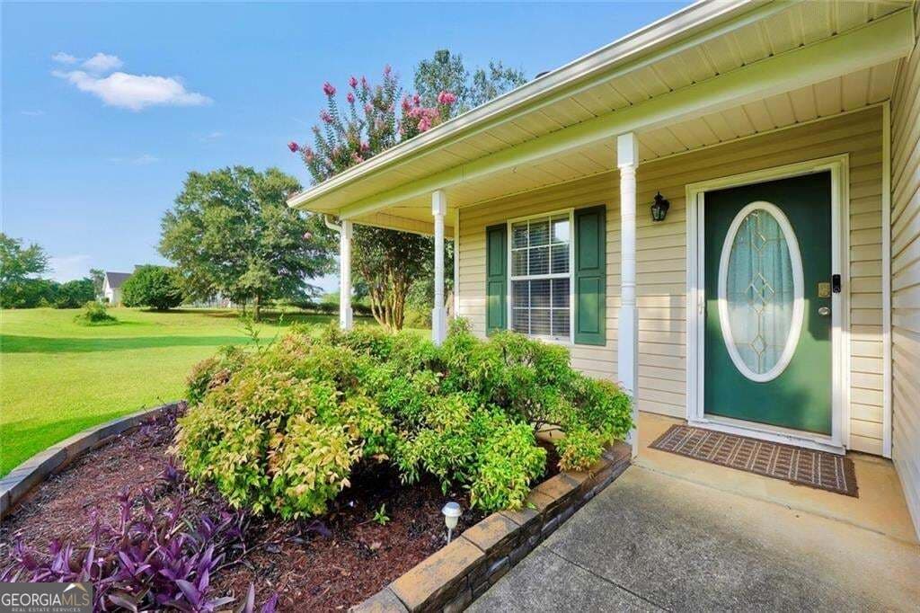 3 bedroom, 2 bathroom, 1,455 sq ft single family residence for sale at 1130 Larkspur Drive, Locust Grove, GA 30248 — photo 6