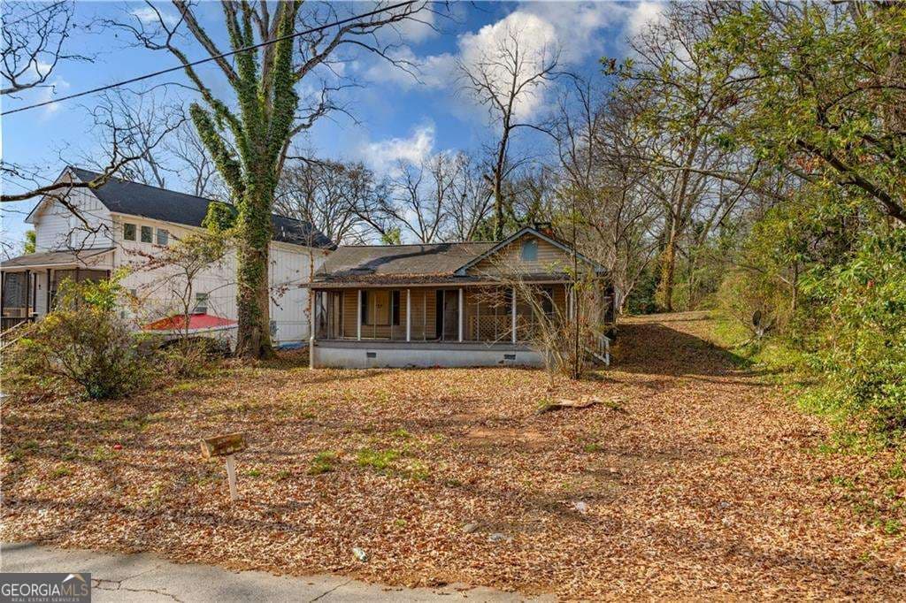 2 bedroom, 1 bathroom, 1,348 sq ft single family residence for sale at 2965 Pearl Street, East Point, GA 30344 — photo 2