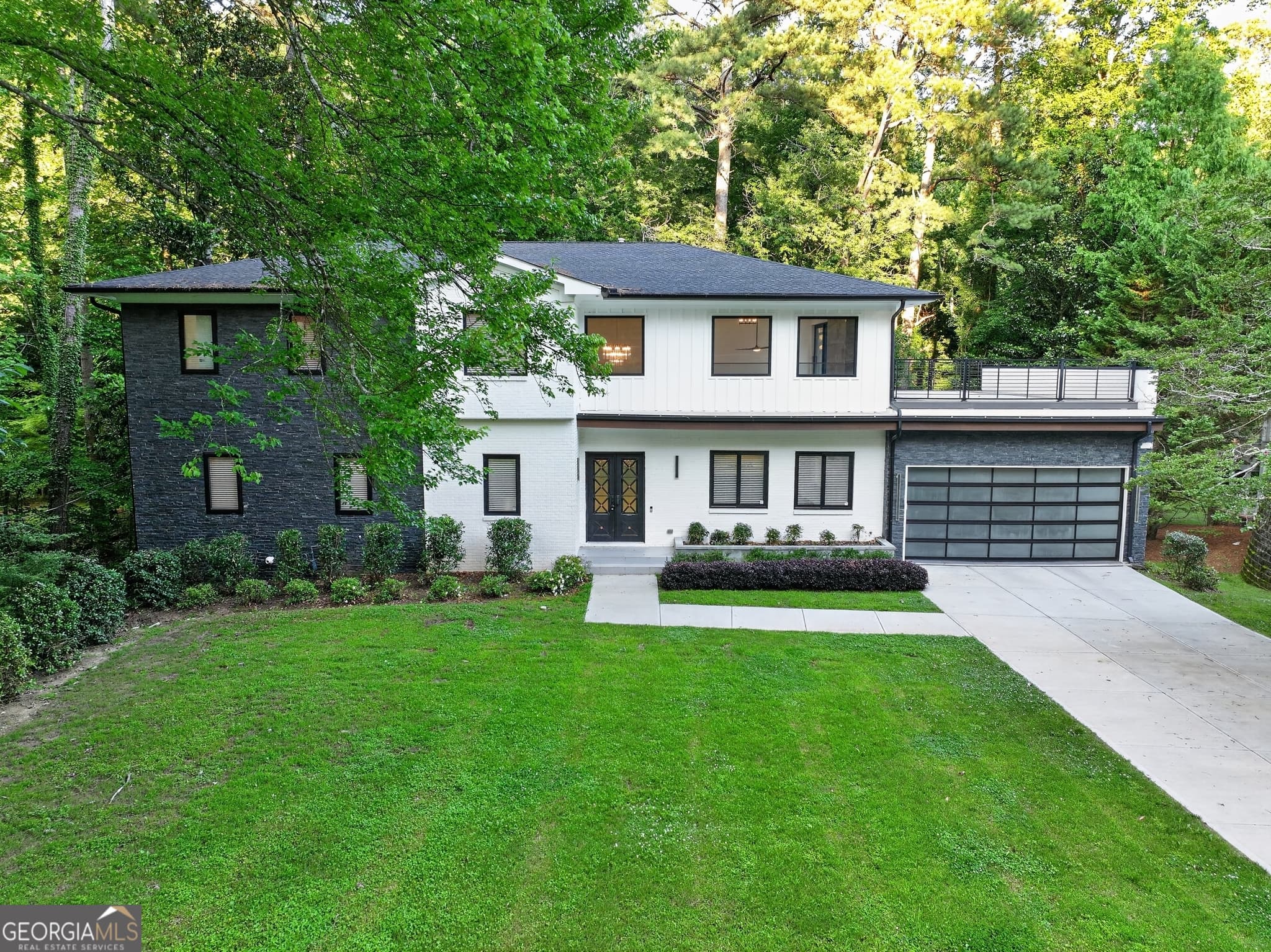 5 bedroom, 5 bathroom, 7,900 sq ft single family residence for sale at 5285 Mount Vernon Parkway, Sandy Springs, GA 30327 — photo 1 of 38