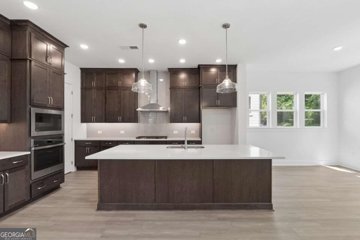 4 bedroom, 4.5 bathroom, 3,012 sq ft single family residence for sale at 4515 Beechnut Circle, Cumming, GA 30028 — photo 8