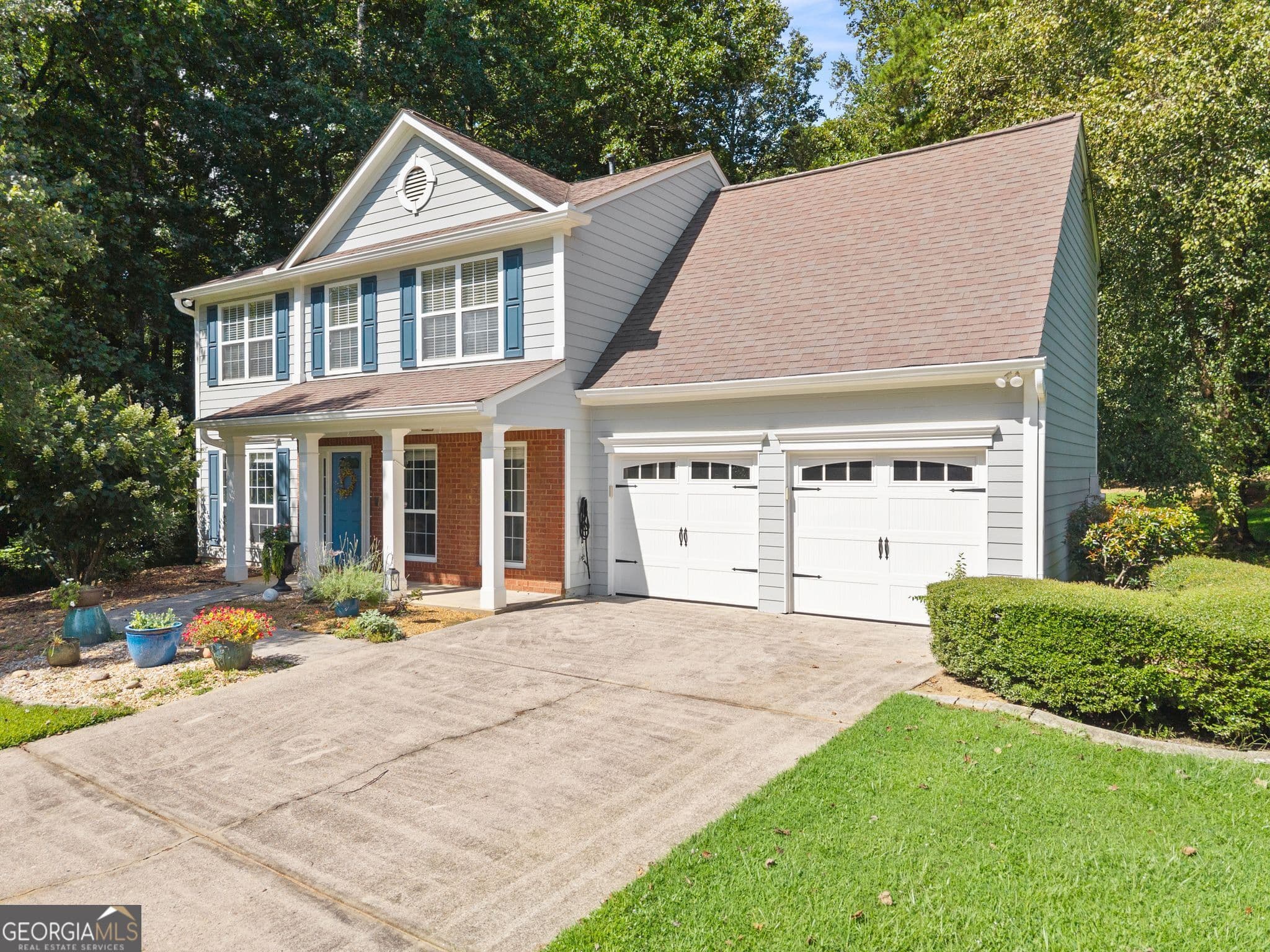 3 bedroom, 2.5 bathroom, 1,847 sq ft single family residence for sale at 5620 Millstone Drive, Cumming, GA 30028 — photo 3