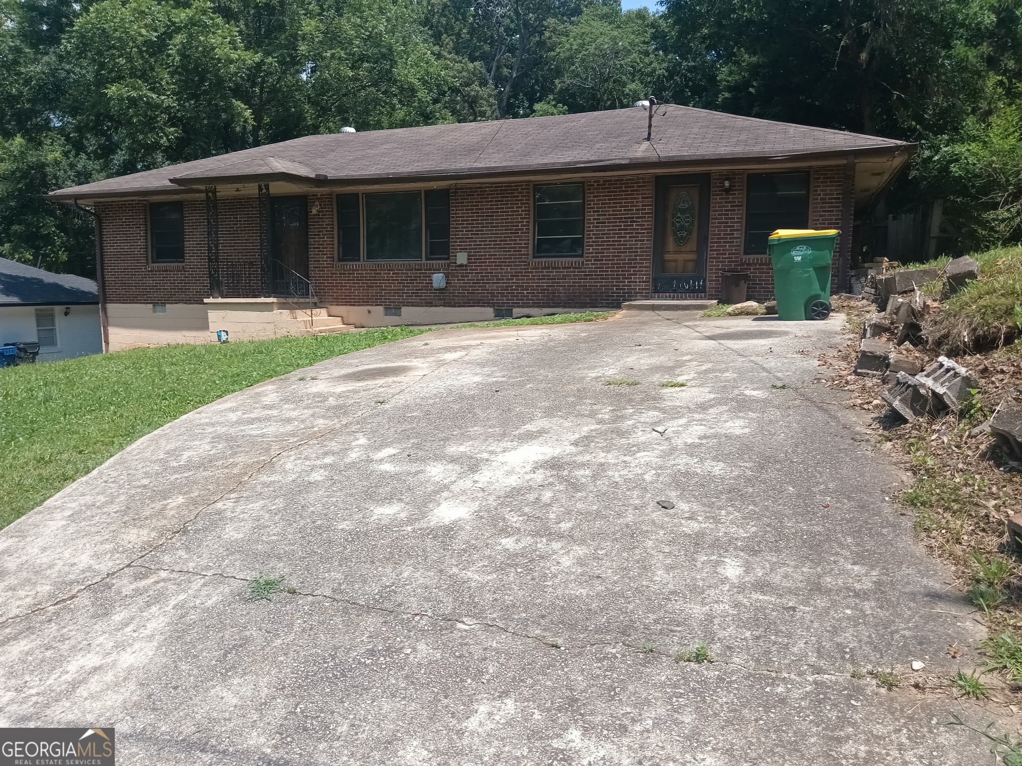 3 bedroom, 2 bathroom, 1,560 sq ft single family residence for sale at 1214 Lloyd Drive, Forest Park, GA 30297 — photo 1 of 12