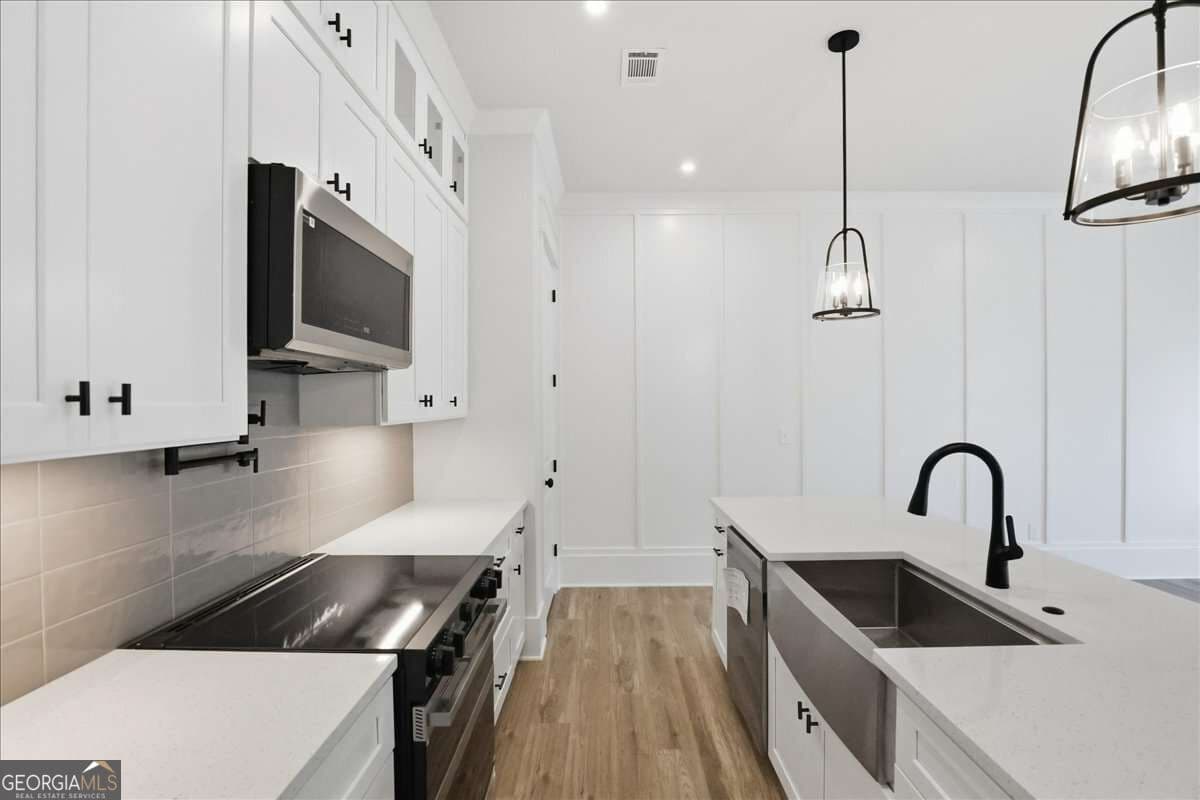 3 bedroom, 2.5 bathroom, 1,870 sq ft townhouse for sale at 297 Orchid Street, Braselton, GA 30517 — photo 6