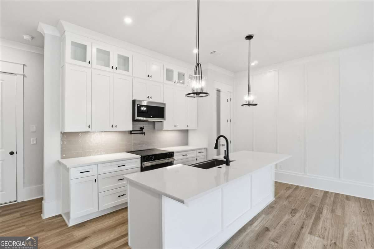 3 bedroom, 2.5 bathroom, 1,870 sq ft townhouse for sale at 297 Orchid Street, Braselton, GA 30517
