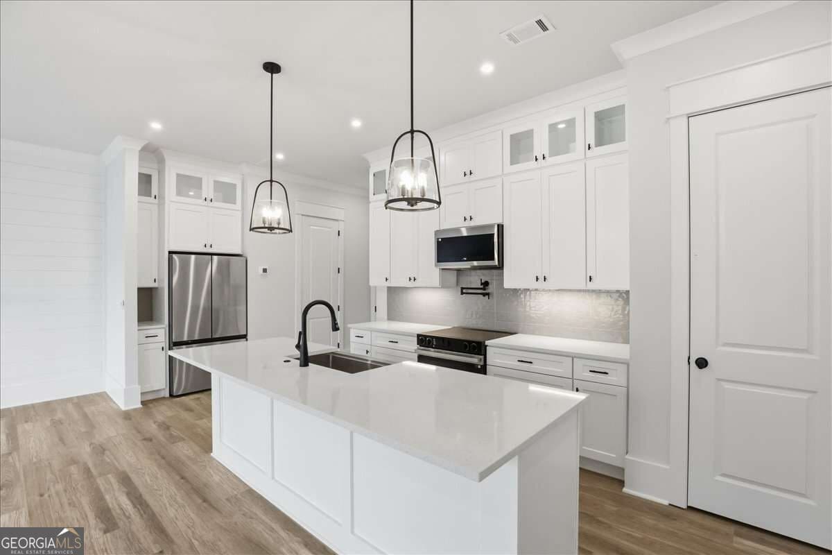 3 bedroom, 2.5 bathroom, 1,870 sq ft townhouse for sale at 297 Orchid Street, Braselton, GA 30517 — photo 5