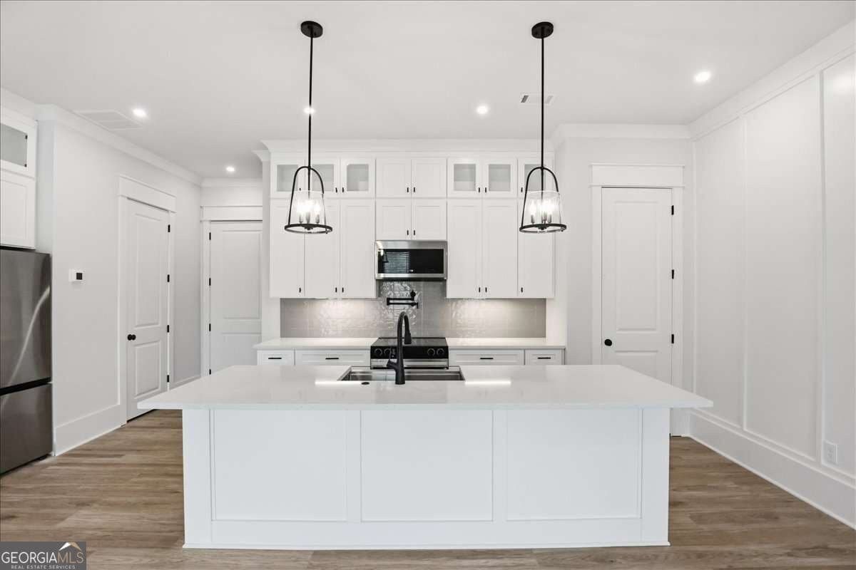 3 bedroom, 2.5 bathroom, 1,870 sq ft townhouse for sale at 297 Orchid Street, Braselton, GA 30517 — photo 4