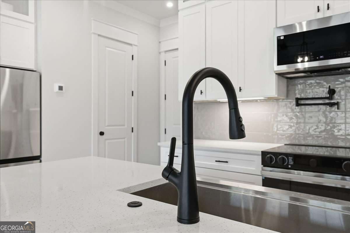 3 bedroom, 2.5 bathroom, 1,870 sq ft townhouse for sale at 297 Orchid Street, Braselton, GA 30517 — photo 8