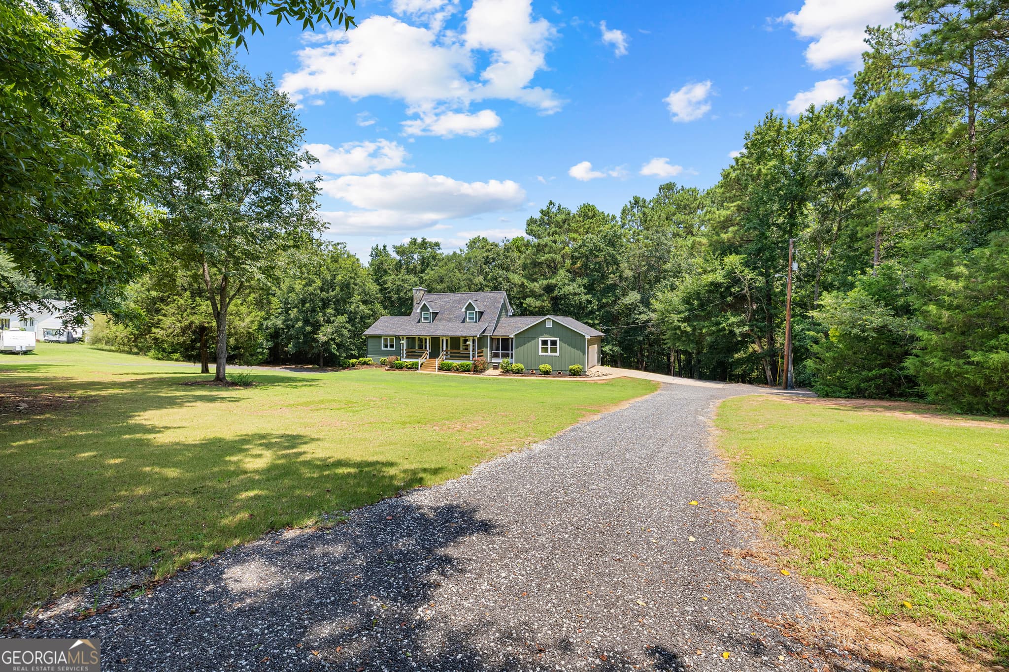 5 bedroom, 3.5 bathroom, 3,388 sq ft single family residence for sale at 318 Teasley Trail, Moreland, GA 30259 — photo 1 of 67