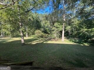 4 bedroom, 2 bathroom single family residence for sale at 1015 County Road 299, Lanett, AL 36863 — photo 3