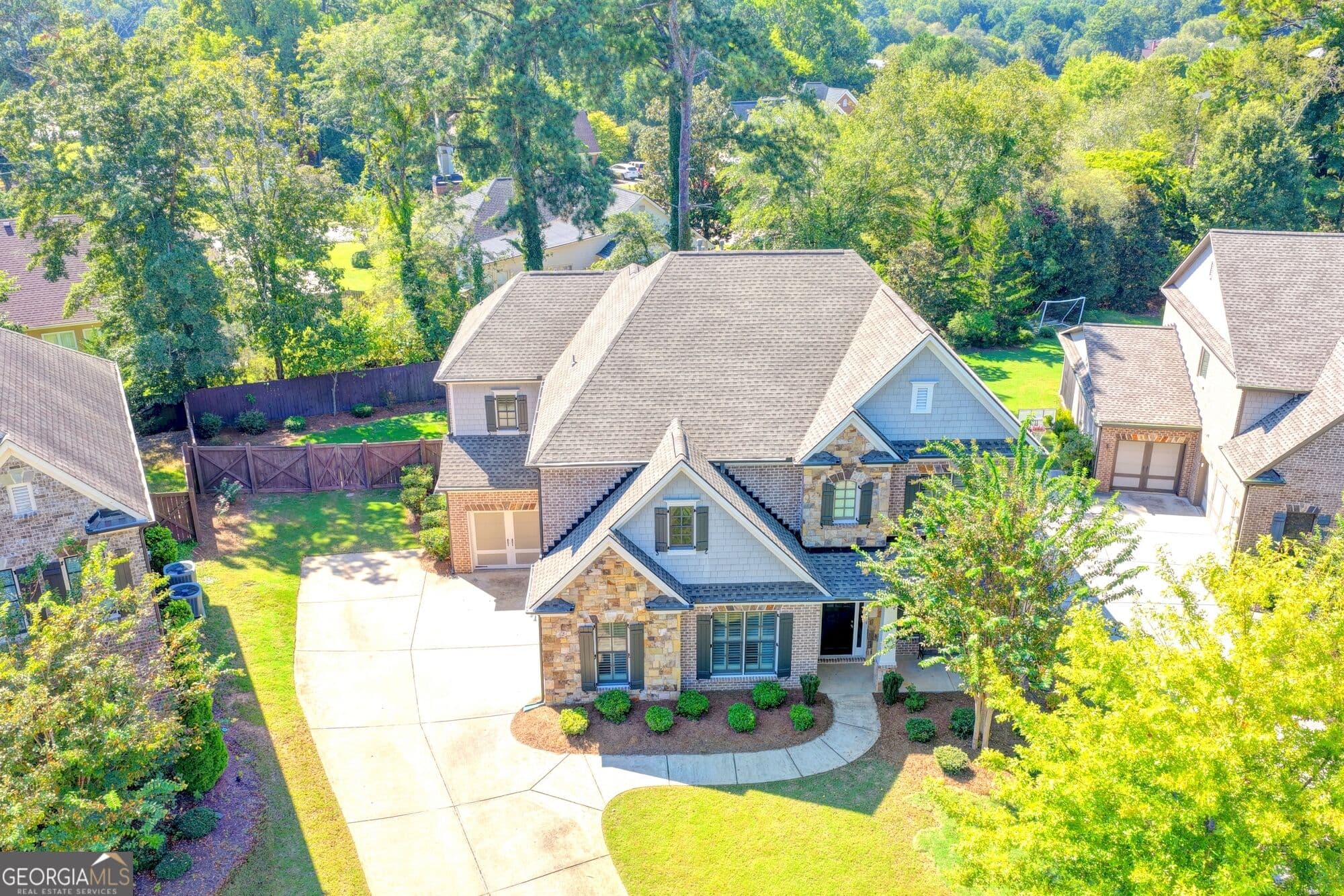 5 bedroom, 4.5 bathroom, 4,102 sq ft single family residence for sale at 4871 Belle Estates Road, Suwanee, GA 30024 — photo 1 of 46