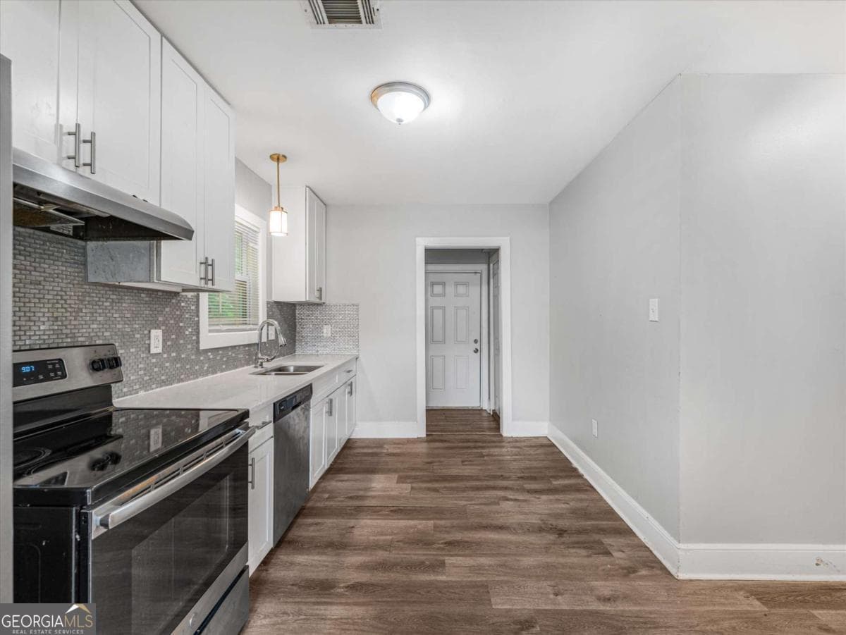 4 bedroom, 2 bathroom single family residence for sale at 2861 Forrest Hills Drive, Atlanta, GA 30315 — photo 6