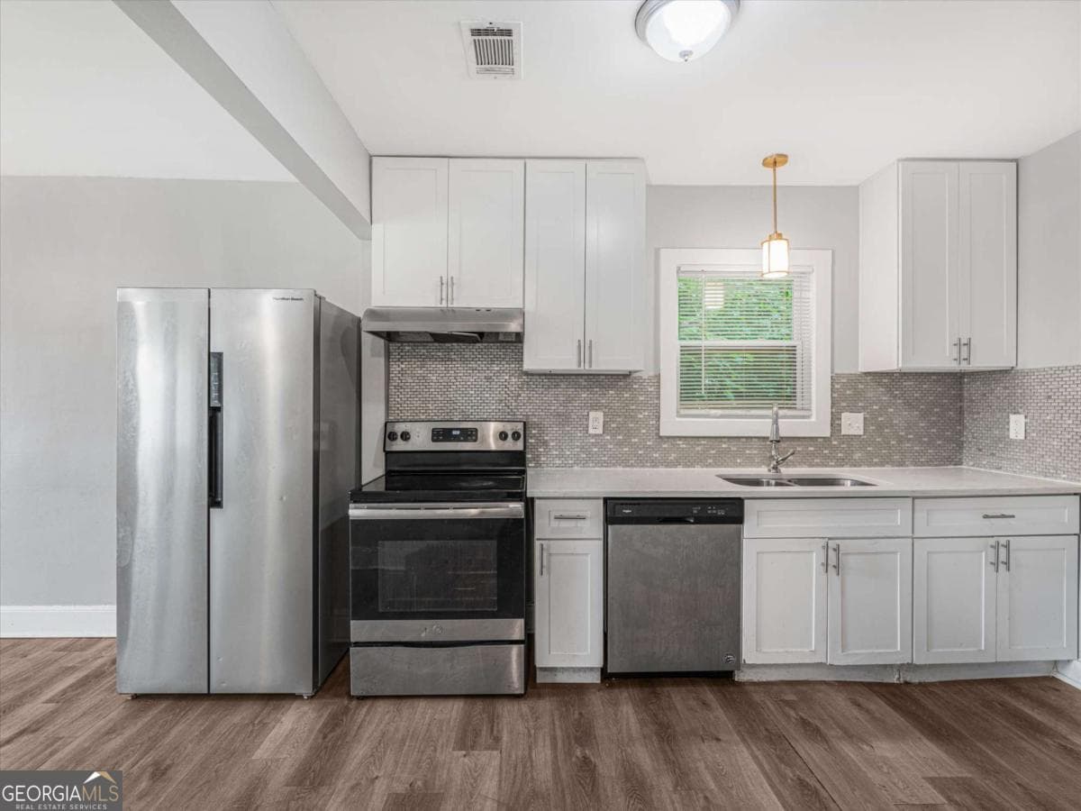 4 bedroom, 2 bathroom single family residence for sale at 2861 Forrest Hills Drive, Atlanta, GA 30315 — photo 7