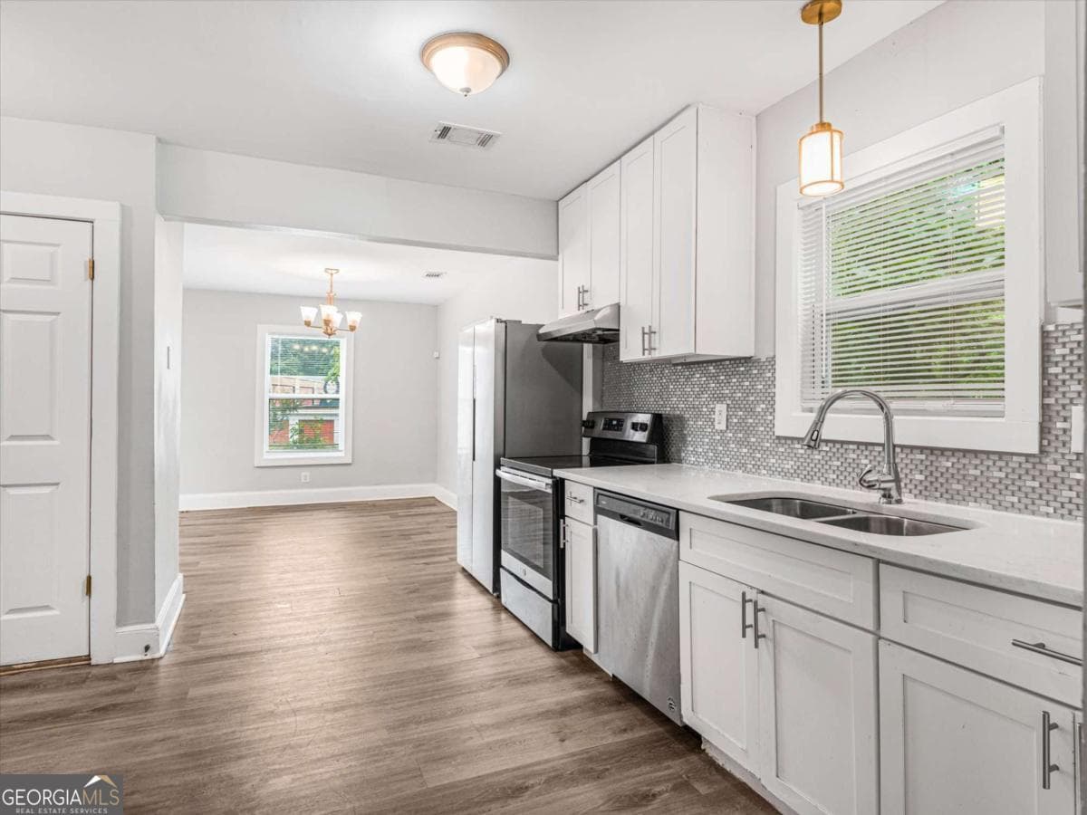 4 bedroom, 2 bathroom single family residence for sale at 2861 Forrest Hills Drive, Atlanta, GA 30315 — photo 9