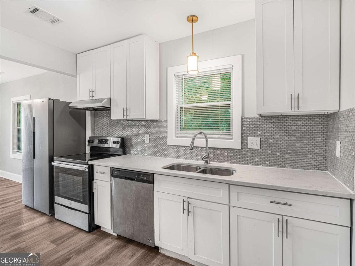 4 bedroom, 2 bathroom single family residence for sale at 2861 Forrest Hills Drive, Atlanta, GA 30315 — photo 8