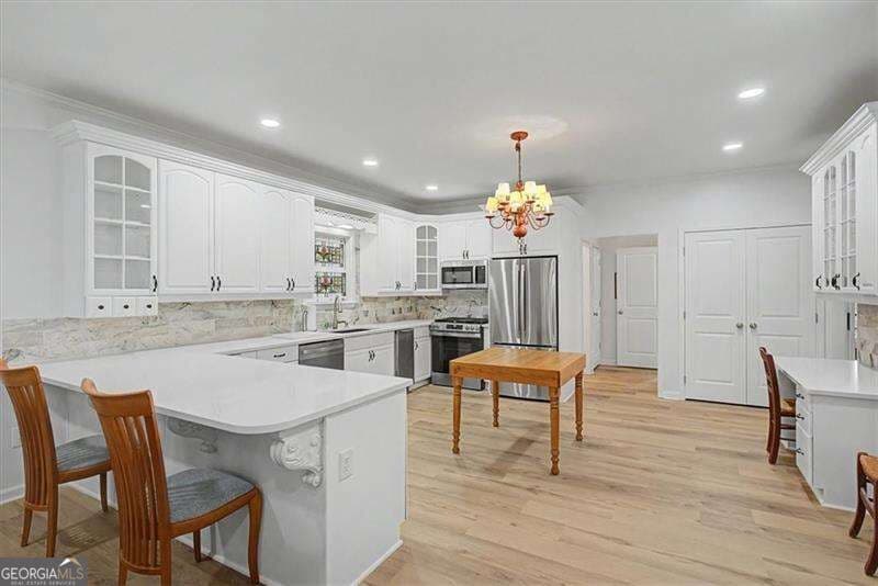4 bedroom, 2.5 bathroom, 2,645 sq ft single family residence for sale at 1050 Wiley Bridge Road, Woodstock, GA 30188 — photo 8