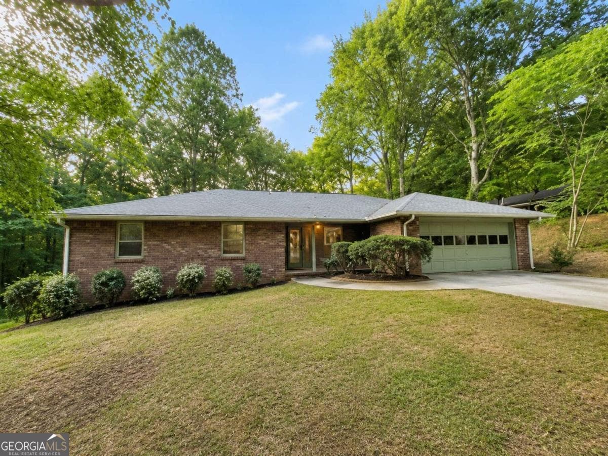 4 bedroom, 3 bathroom, 1,666 sq ft single family residence sold at 1512 Pine Circle, Lawrenceville, GA 30044
