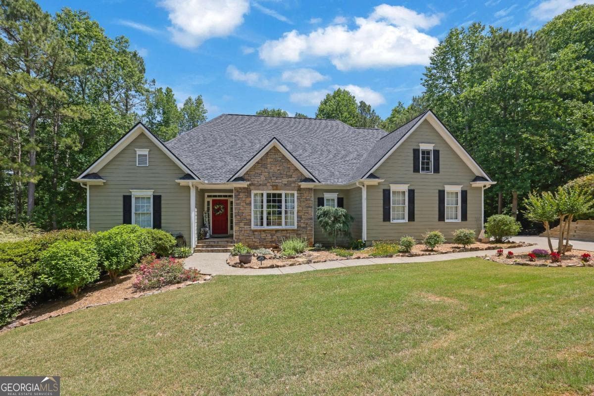 5 bedroom, 4 bathroom, 4,563 sq ft single family residence sold at 9645 Old Riverside Lane, Ball Ground, GA 30107