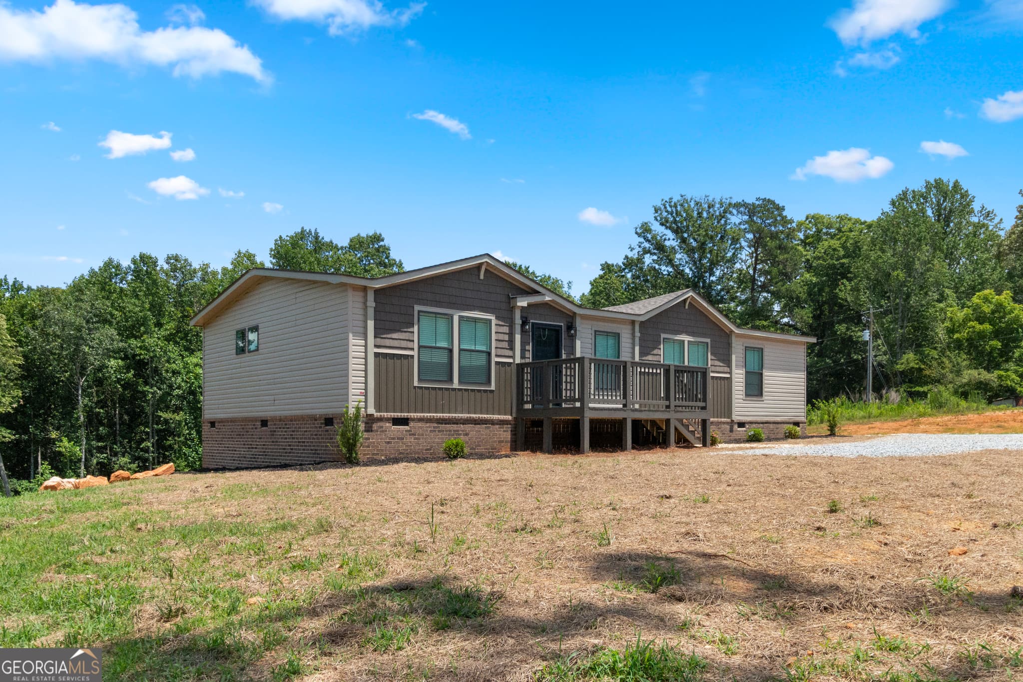 3 bedroom, 2 bathroom, 1,530 sq ft manufactured home,single family residence for sale at 654 Robertson Loop Road, Clarkesville, GA 30523 — photo 2