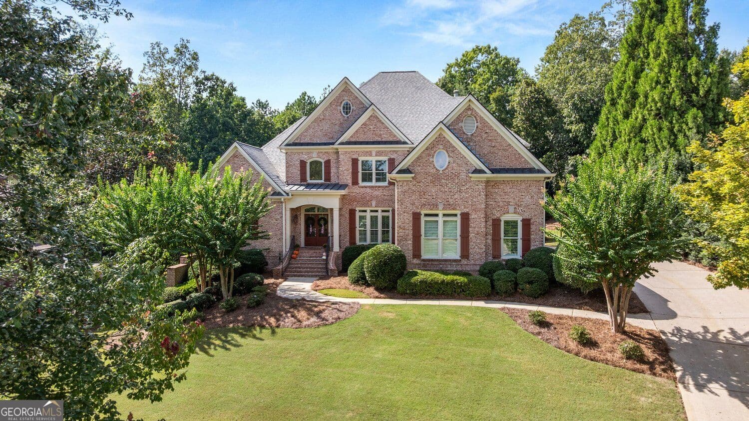 5 bedroom, 5.5 bathroom, 6,383 sq ft single family residence for sale at 8030 Coventry Pointe, Suwanee, GA 30024 — photo 1 of 58
