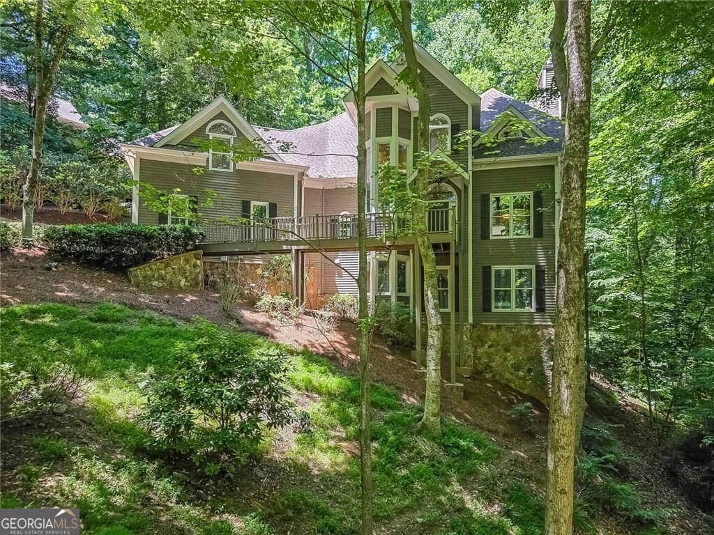 4 bedroom, 3 bathroom, 4,857 sq ft single family residence for sale at 3712 Frederica Road, Berkeley Lake, GA 30096