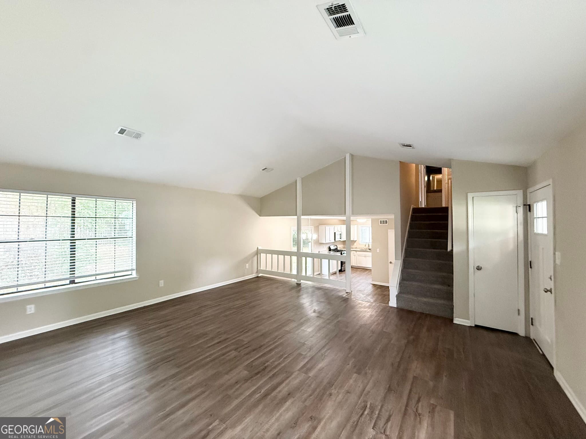 4 bedroom, 2 bathroom, 1,940 sq ft single family residence for sale at 1061 Mainstreet Lake Drive, Stone Mountain, GA 30088 — photo 4