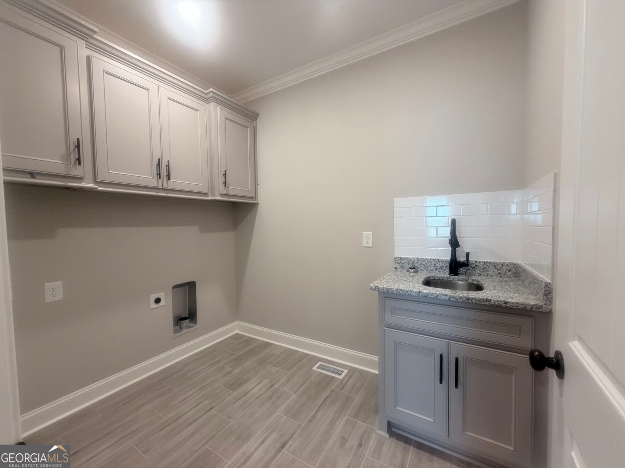 5 bedroom, 3.5 bathroom, 3,223 sq ft single family residence for sale at 2577 Blazing Star Court, Statham, GA 30666 — photo 6