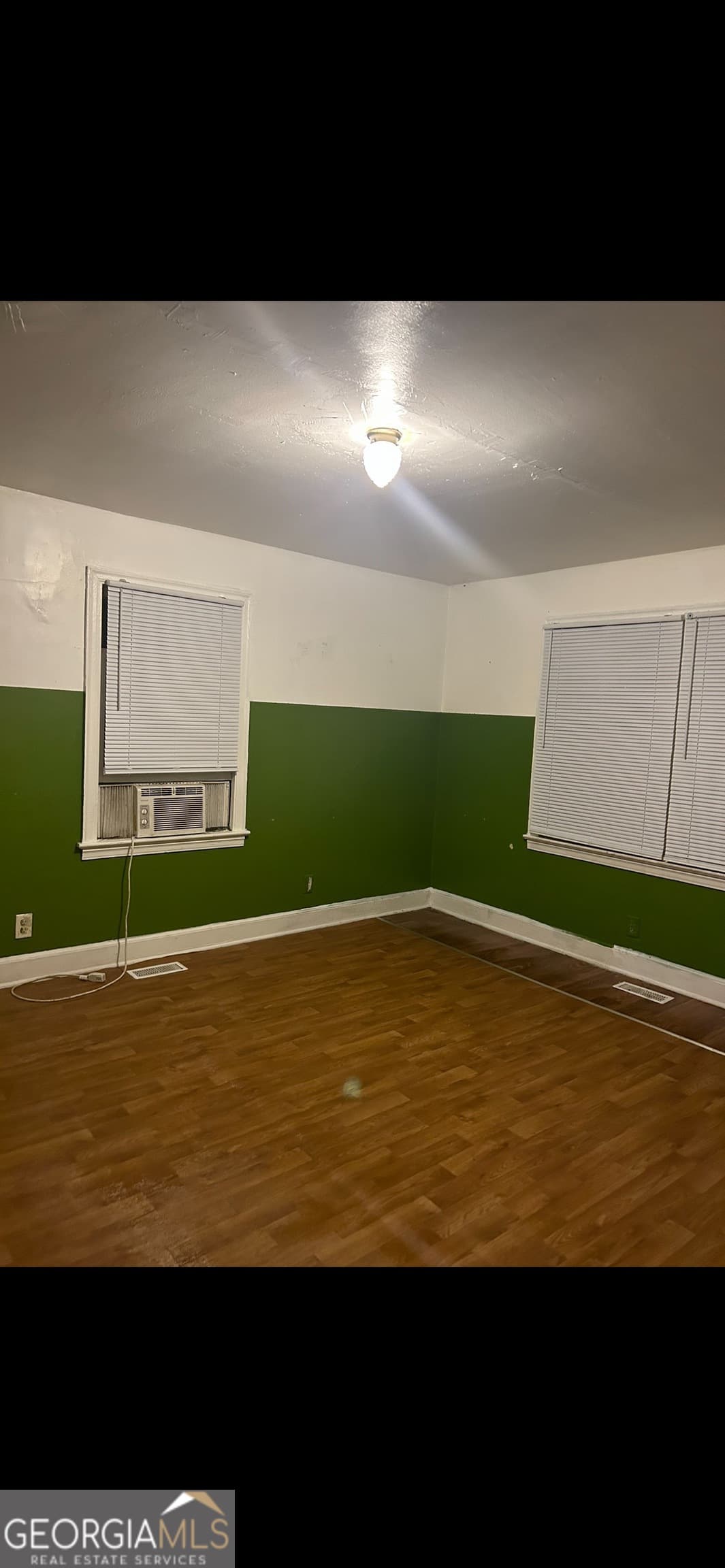 3 bedroom, 1 bathroom, 1,226 sq ft single family residence for sale at 390 Charlotte Boulevard, Stockbridge, GA 30281 — photo 3