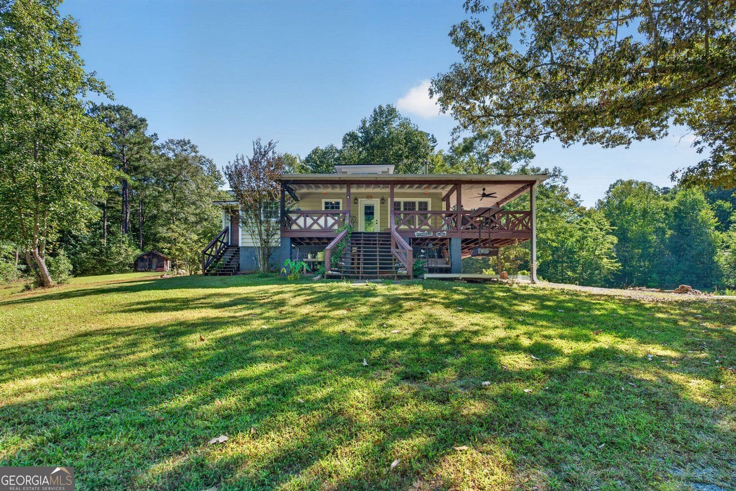 2 bedroom, 2 bathroom, 1,068 sq ft cabin,single family residence for sale at 9170 Wilkerson Mill Road, Chattahoochee Hills, GA 30268