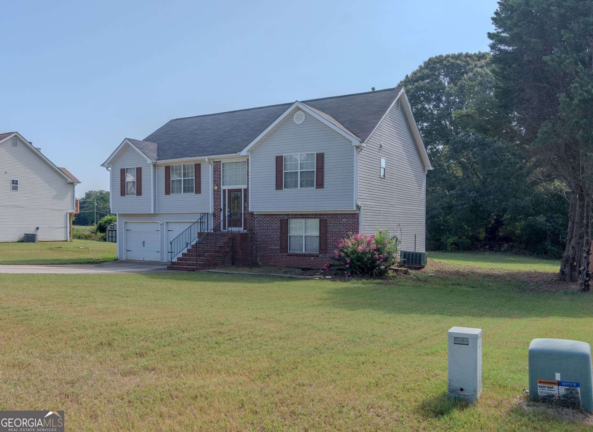 4 bedroom, 3 bathroom single family residence for sale at 4778 Clayton Crossing Lane, Ellenwood, GA 30294 — photo 3