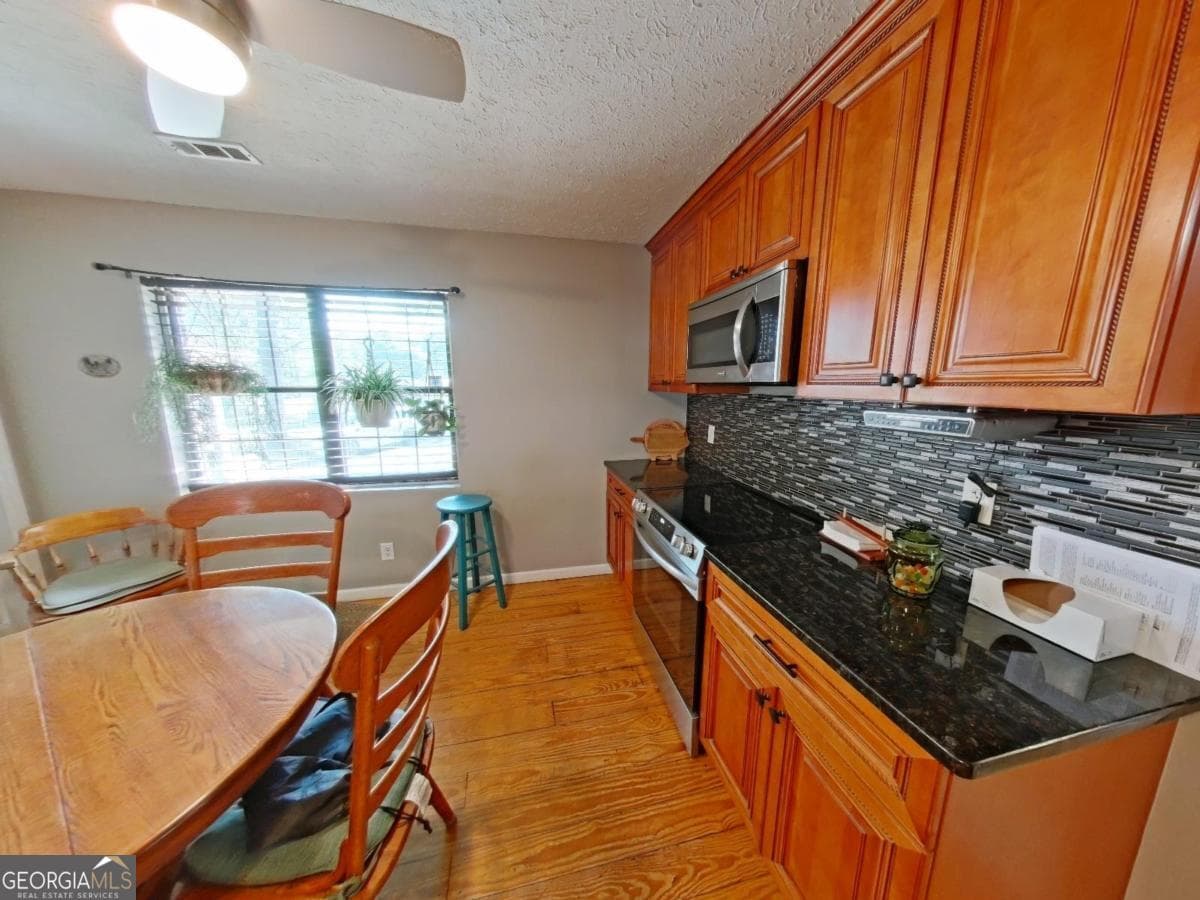 4 bedroom, 2 bathroom, 2,115 sq ft single family residence for sale at 103 Brookwood Drive, Eatonton, GA 31024 — photo 6