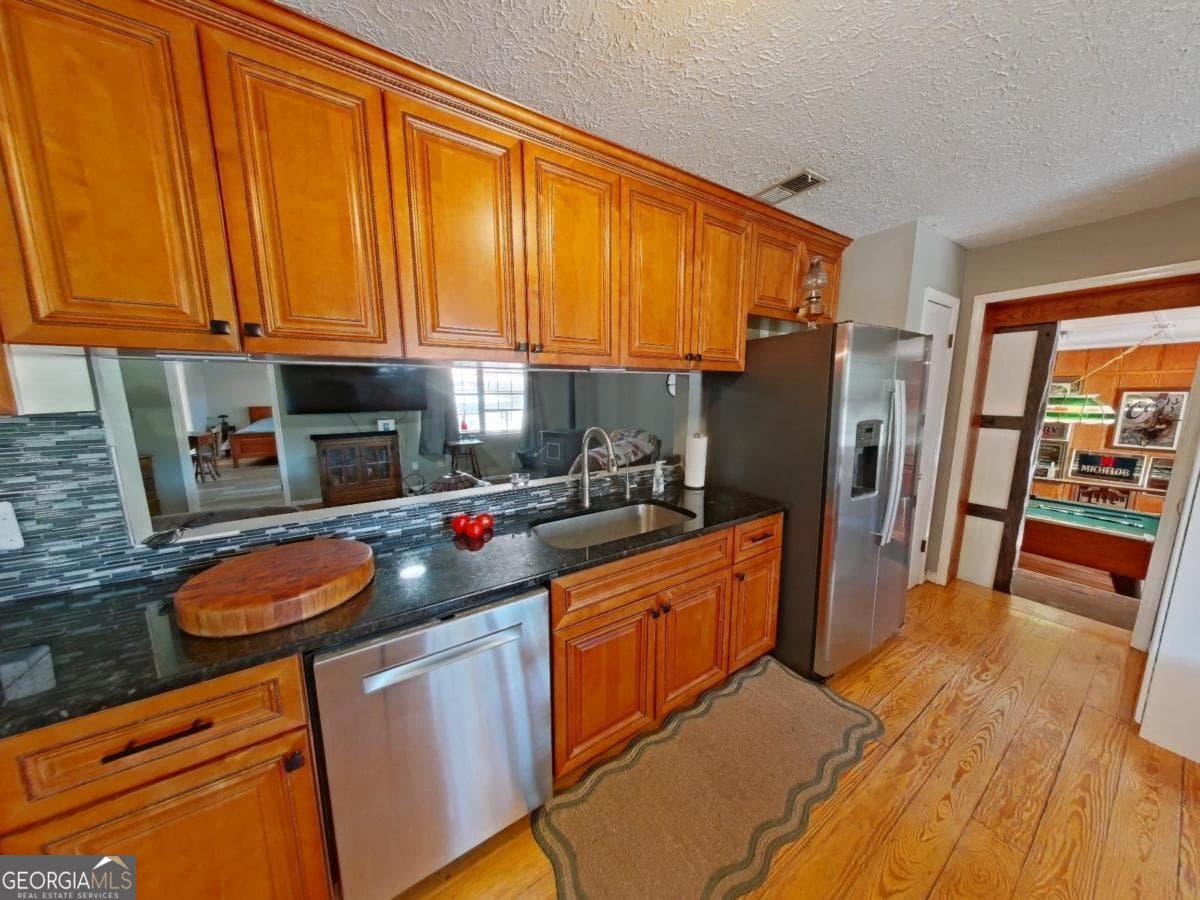 4 bedroom, 2 bathroom, 2,115 sq ft single family residence for sale at 103 Brookwood Drive, Eatonton, GA 31024 — photo 7