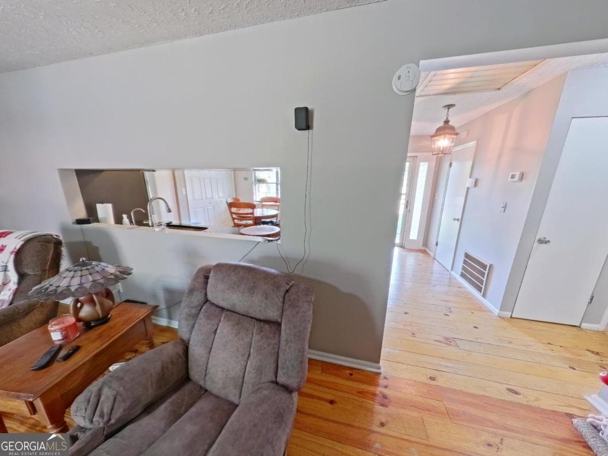 4 bedroom, 2 bathroom, 2,115 sq ft single family residence for sale at 103 Brookwood Drive, Eatonton, GA 31024 — photo 4