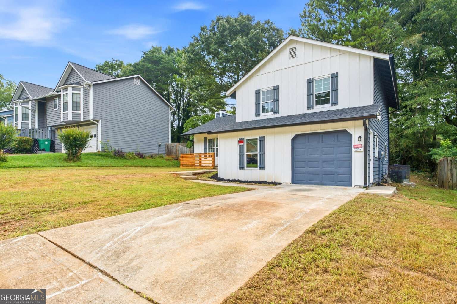 4 bedroom, 3 bathroom, 1,618 sq ft single family residence for sale at 917 Lake Watch Drive, Stone Mountain, GA 30088 — photo 3