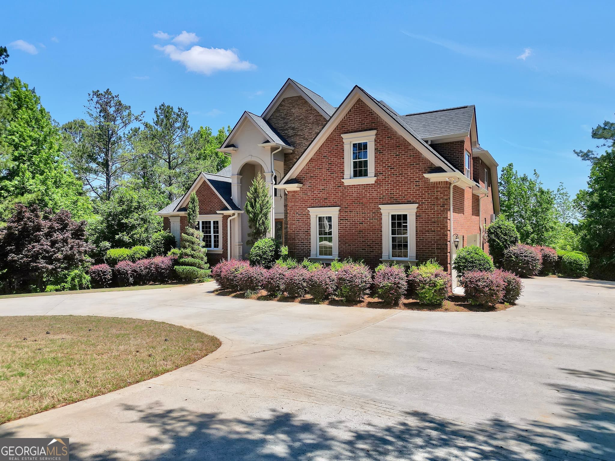 5 bedroom, 4 bathroom, 5,942 sq ft single family residence for sale at 115 Forest Overlook Drive, Forsyth, GA 31029 — photo 3
