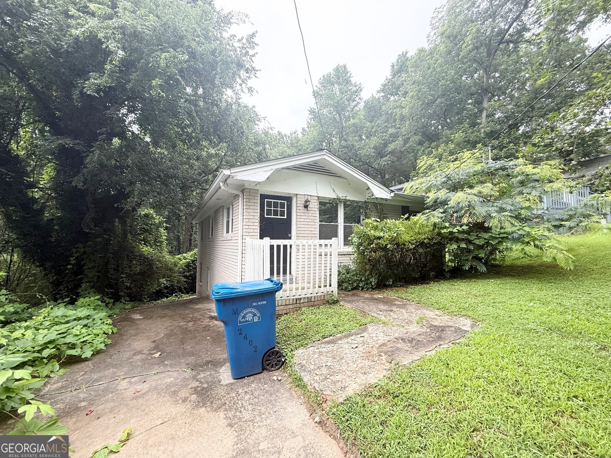 4 bedroom, 1 bathroom, 1,778 sq ft single family residence for sale at 2402 Main Street, Atlanta, GA 30318 — photo 2