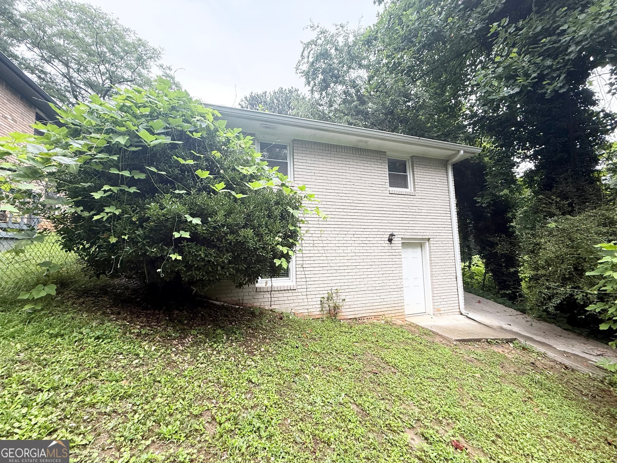 4 bedroom, 1 bathroom, 1,778 sq ft single family residence for sale at 2402 Main Street, Atlanta, GA 30318 — photo 3
