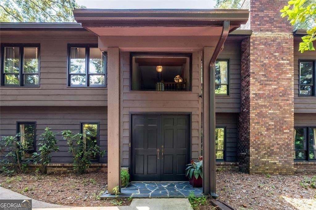 3 bedroom, 4 bathroom, 6,432 sq ft single family residence for sale at 1921 Lilburn Stone Mountain Road, Smoke Rise, GA 30087 — photo 6