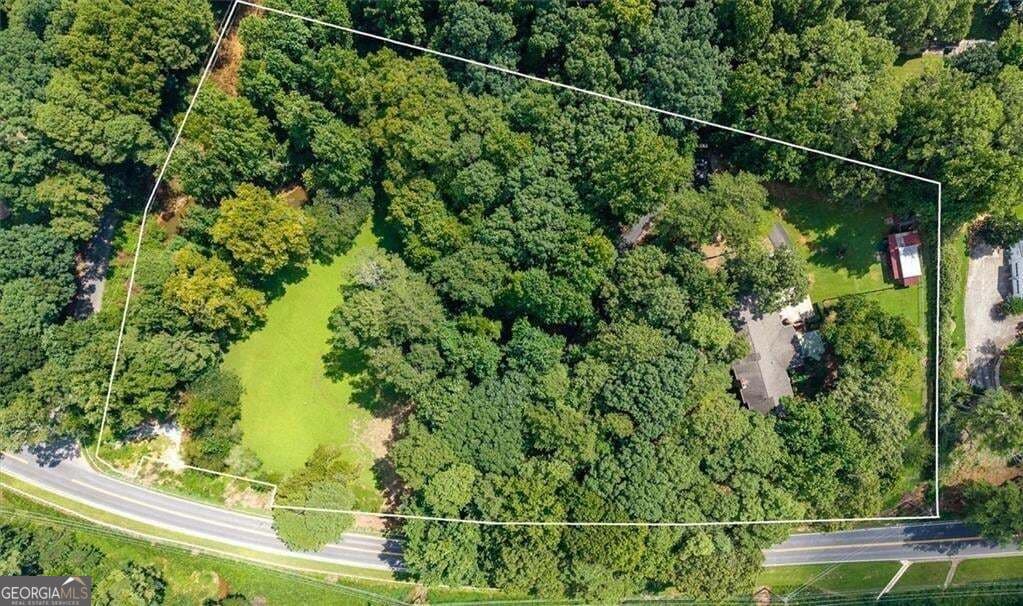3 bedroom, 4 bathroom, 6,432 sq ft single family residence for sale at 1921 Lilburn Stone Mountain Road, Smoke Rise, GA 30087 — photo 3