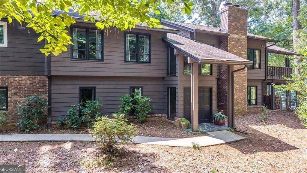 3 bedroom, 4 bathroom, 6,432 sq ft single family residence for sale at 1921 Lilburn Stone Mountain Road, Smoke Rise, GA 30087 — photo 5
