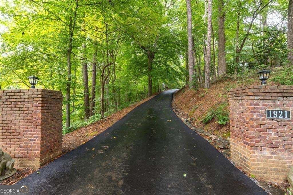3 bedroom, 4 bathroom, 6,432 sq ft single family residence for sale at 1921 Lilburn Stone Mountain Road, Smoke Rise, GA 30087 — photo 4