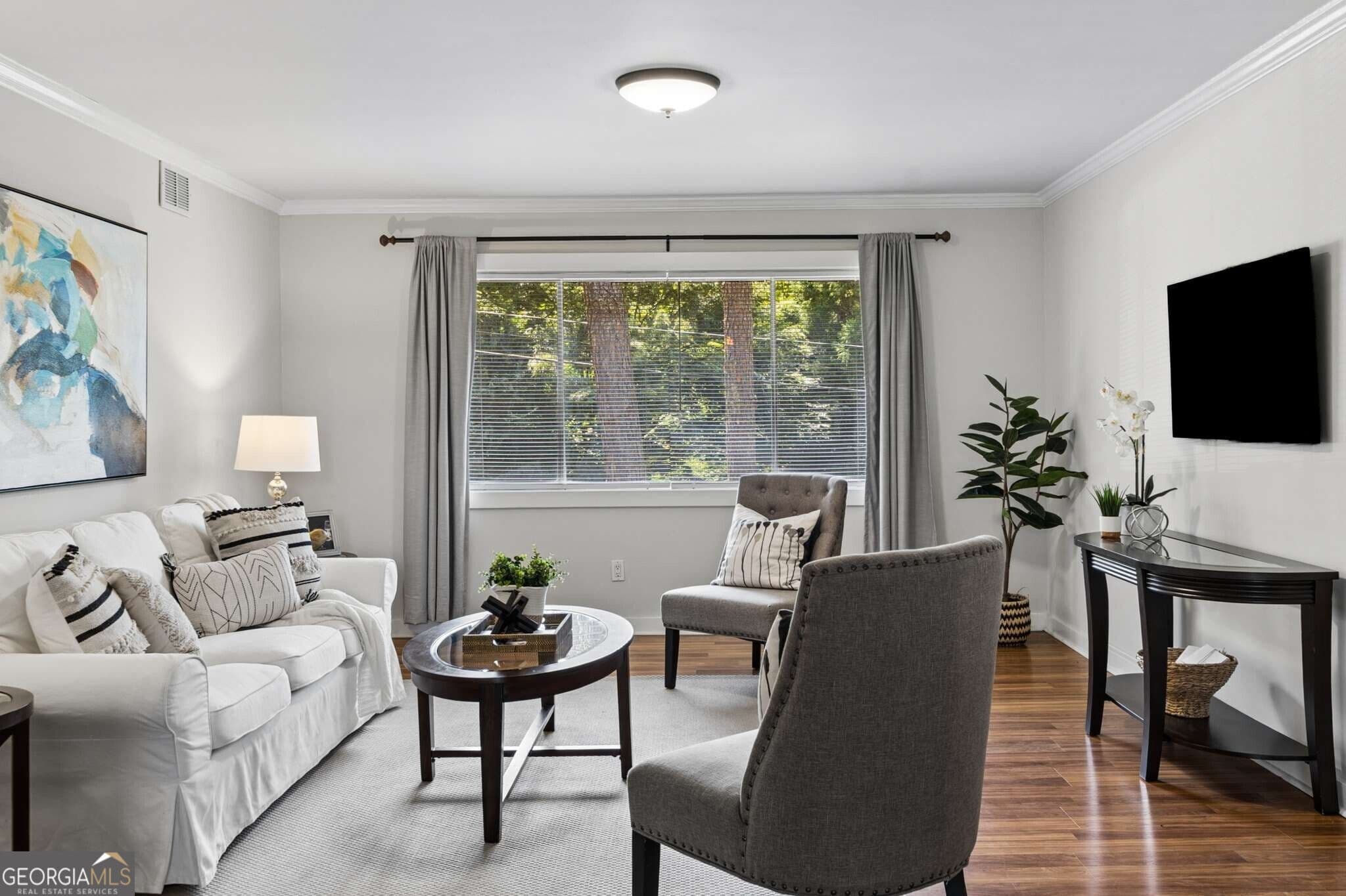 2 bedroom, 2 bathroom, 1,084 sq ft condominium for sale at 115 Biscayne Drive A6, Atlanta, GA 30309 — photo 1 of 27