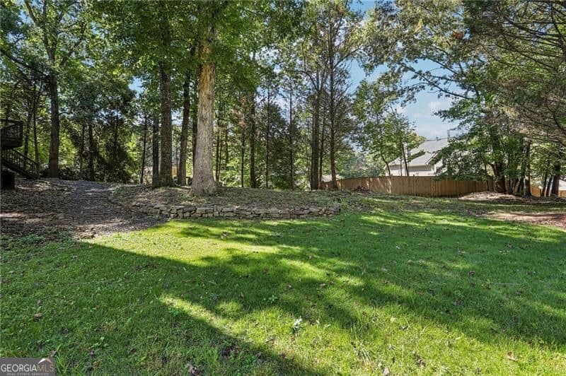 6 bedroom, 5 bathroom, 4,629 sq ft single family residence for sale at 4104 Hooch River Trail, Suwanee, GA 30024 — photo 10