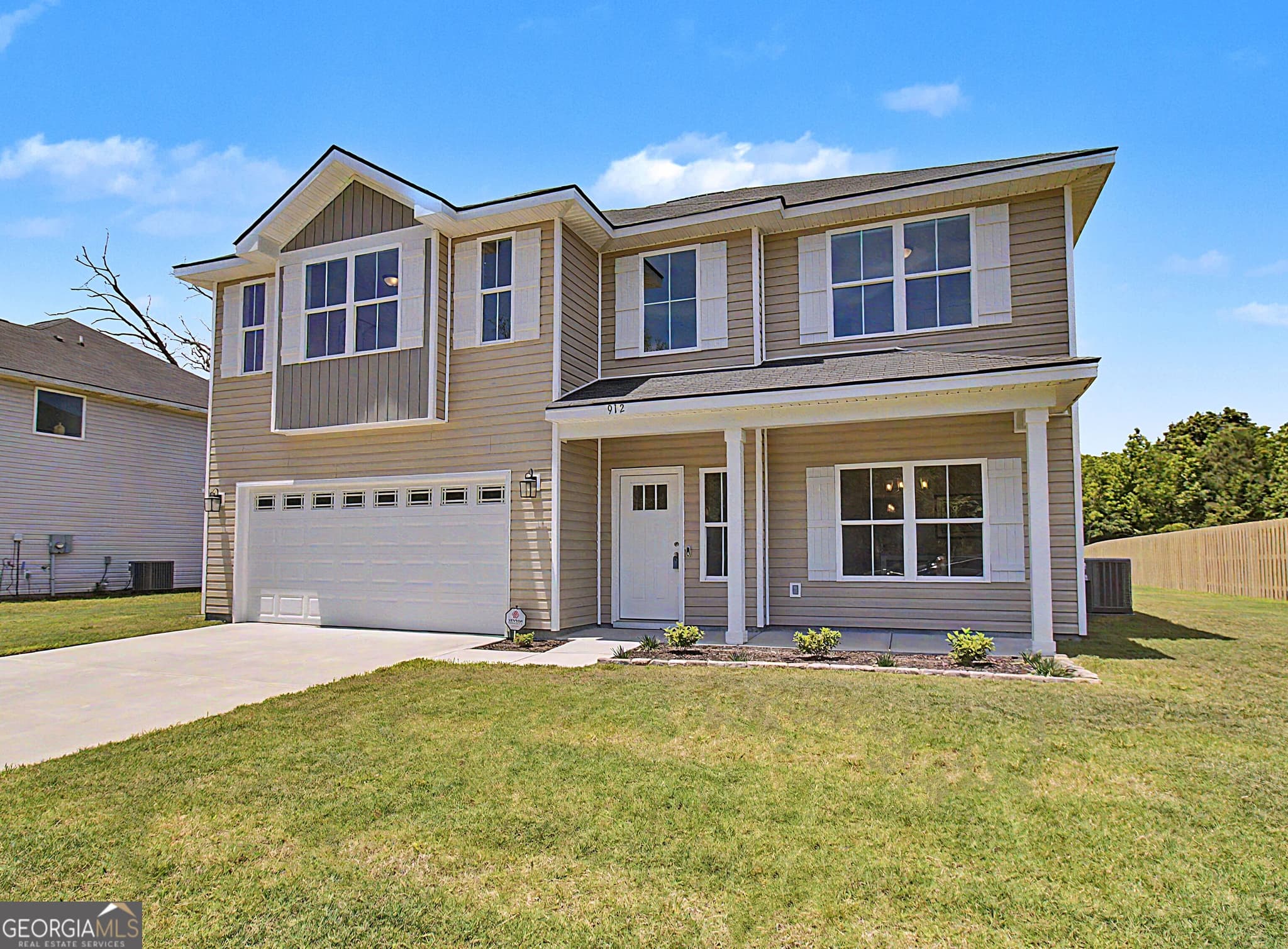 4 bedroom, 2.5 bathroom, 2,438 sq ft single family residence for sale at 912 Meloney Drive, Hinesville, GA 31313 — photo 2