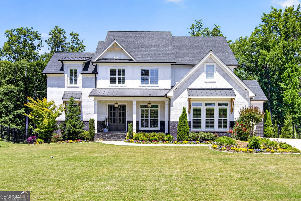 6 bedroom, 6 bathroom, 6,350 sq ft single family residence for sale at 3528 N Bogan Road, Buford, GA 30519 — photo 2