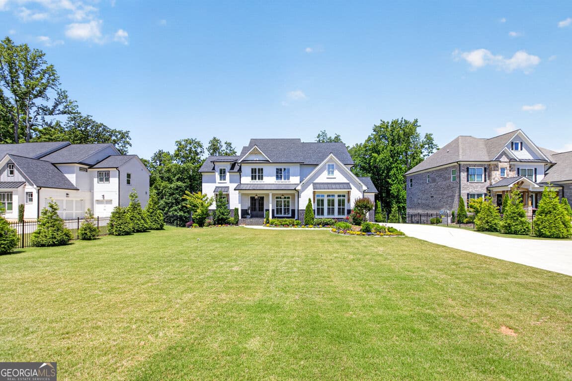 6 bedroom, 6 bathroom, 6,350 sq ft single family residence for sale at 3528 N Bogan Road, Buford, GA 30519