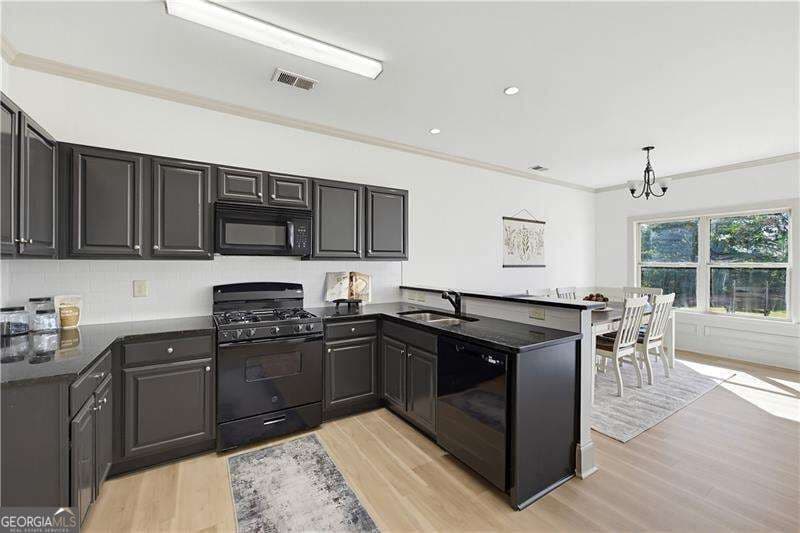 4 bedroom, 2.5 bathroom single family residence for sale at 152 Mount Moriah Road, Ball Ground, GA 30107 — photo 9