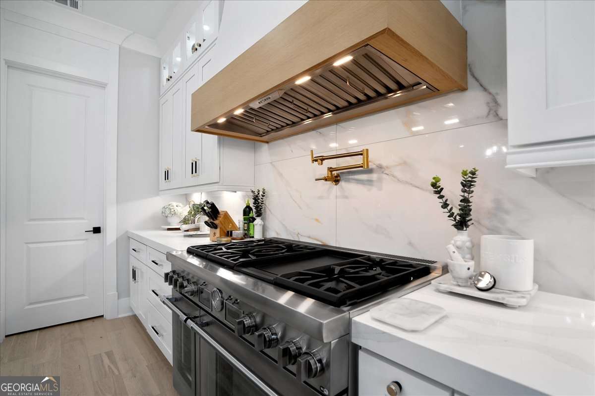 5 bedroom, 4.5 bathroom, 5,961 sq ft single family residence for sale at 1017 Fleeman Road, Hoschton, GA 30548 — photo 8